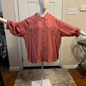 Gorgeous oversized salmon colored blouse with uneven bottom